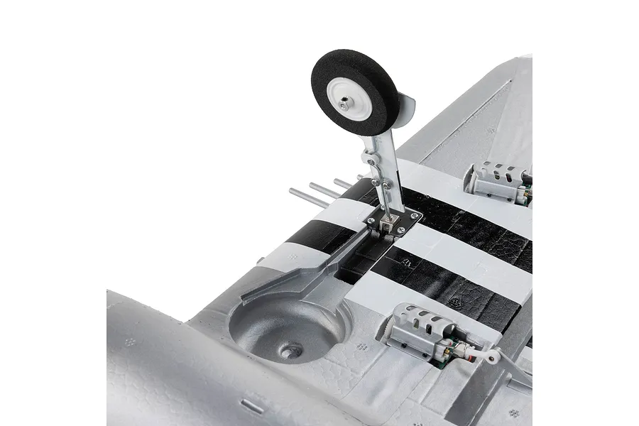 Close-up of the underside of the E-Flite Micro P-47 Thunderbolt RC plane, showing the landing gear and wing mechanics.