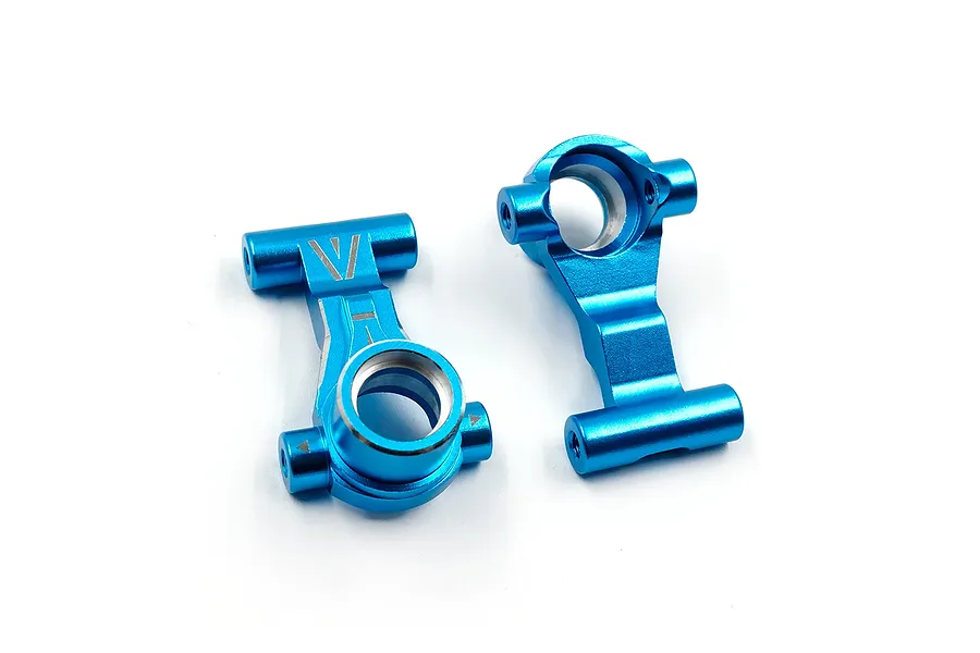 Two blue anodized aluminium front steering hubs for RC cars shown against a clean white background.