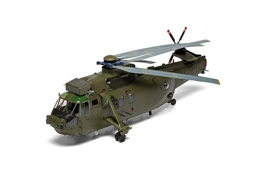 Completed Airfix 1/48 scale Westland Sea King HC.4 helicopter plastic model painted in military green against a white background.