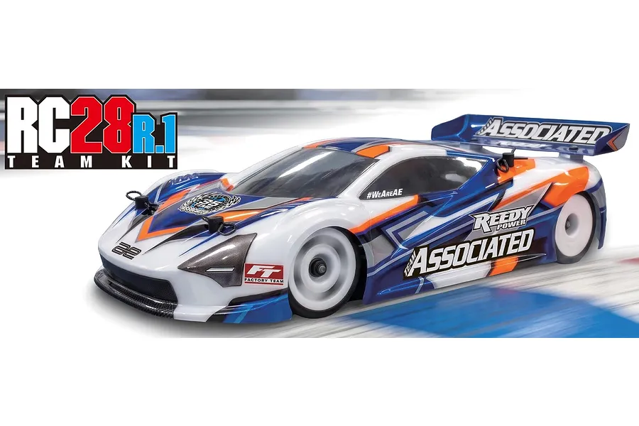 Team Associated RC28R.1 Team Kit RC car in motion on a track with white, blue, and orange racing livery and branding graphics.
