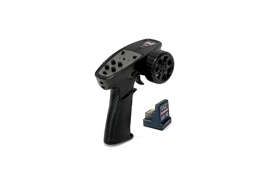 RGT MG4-BS black pistol grip RC transmitter with steering wheel and matching R4P-BS receiver on a white background.