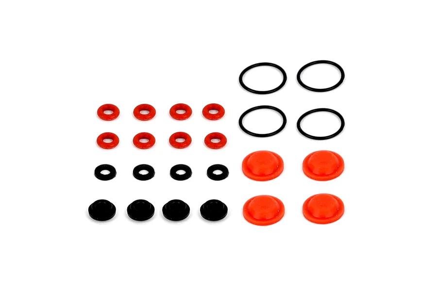 RGT shock rebuild set containing various red and black rubber o-rings and seals arranged on a white background.