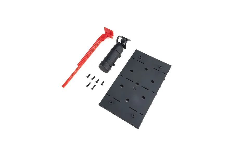 Axial Jeep JT bed accessories including a flat black plate, red jack tool, black canister accessory, and small mounting screws on a white background.