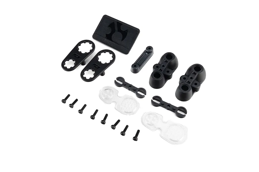Axial Jeep JT scale taillights, license plate, clear lenses, and mounting hardware set laid out on white.