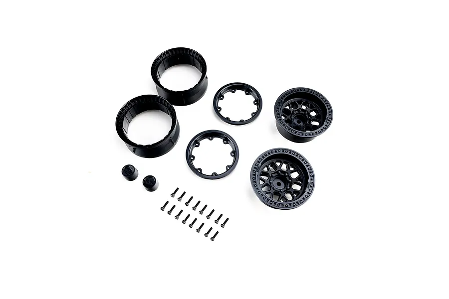 Axial 1/10 1.9 KMC Grenade black beadlock wheel components including rims, rings, caps, and hardware neatly laid out on a white background.