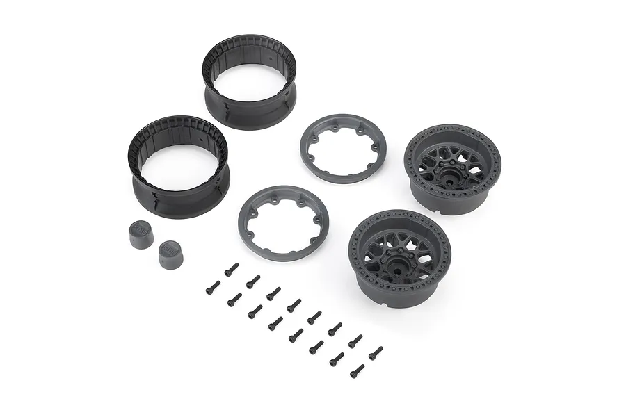 Axial 1/10 1.9 KMC Grenade beadlock wheels set in gray, including rims, rings, caps, and hardware on white background.