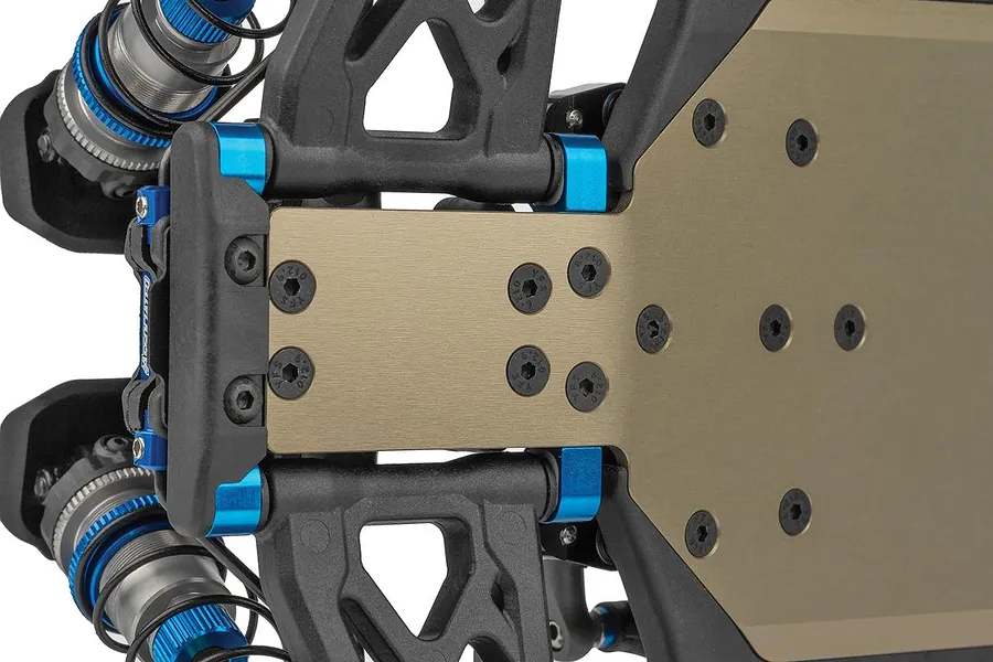 Close-up of the front suspension and chassis plate on the Team Associated RC10B84.1 RC buggy kit.