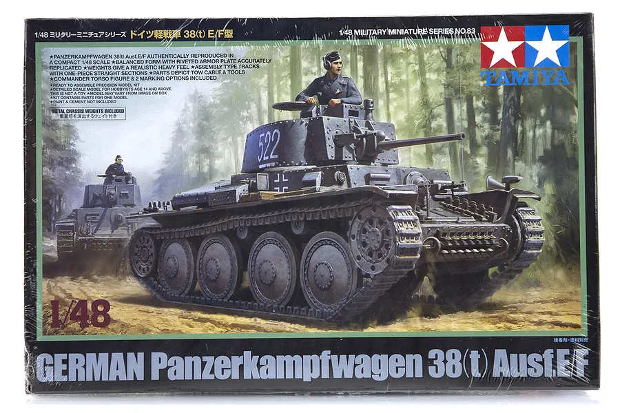 Tamiya 1/48 scale German Panzerkampfwagen 38(t) Ausf.E/F plastic model kit box art showing two tanks in a forest setting.