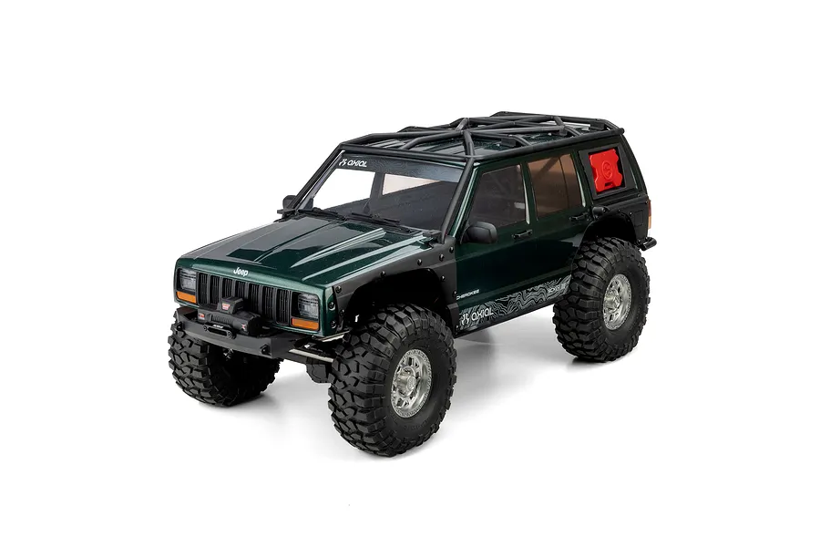 Axial SCX10 III Jeep Cherokee XJ 1/10 scale green RC rock crawler studio shot on white background