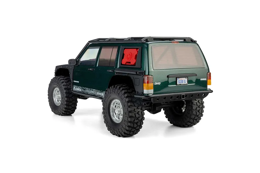 Rear three-quarter studio view of the green Axial SCX10 III Jeep Cherokee XJ RC rock crawler showing scale details.
