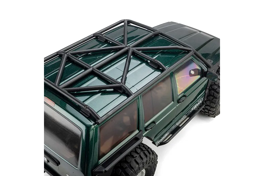 High-angle close-up view of the roof rack and upper body of the green Axial SCX10 III Jeep Cherokee XJ RC crawler.