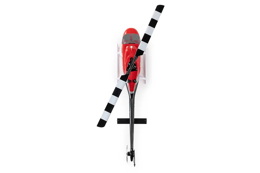 Top-down view of the Blade Jet Ranger RC helicopter showing its red fuselage, black and white striped main rotor blades, and tail boom against a plain white background.
