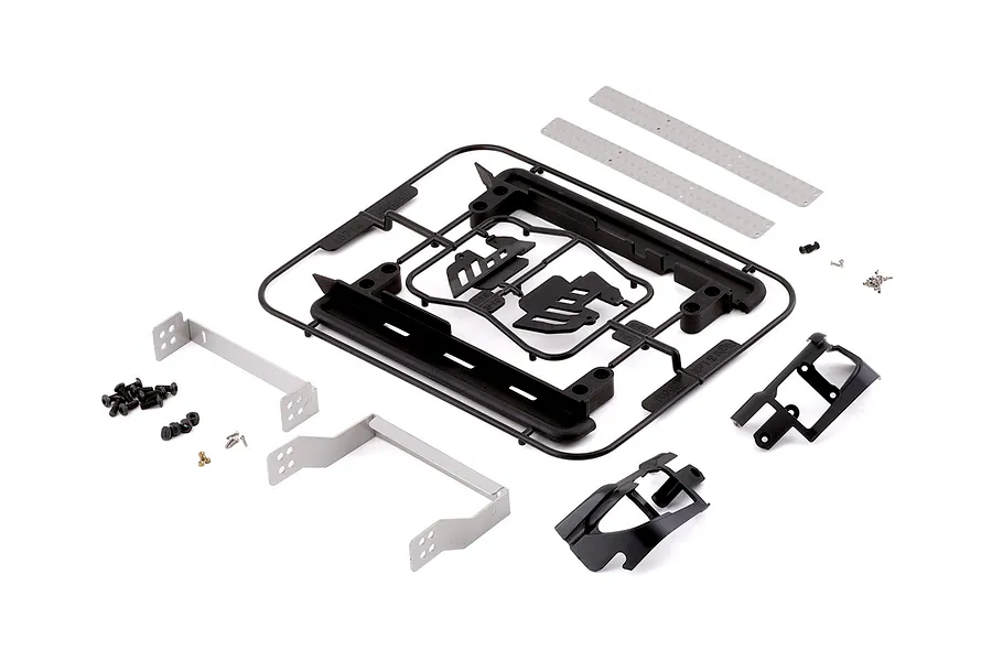 Killerbody 1/10 Toyota Land Cruiser 70 hard body kit accessories including a roof rack, brackets, and hardware on a white background.