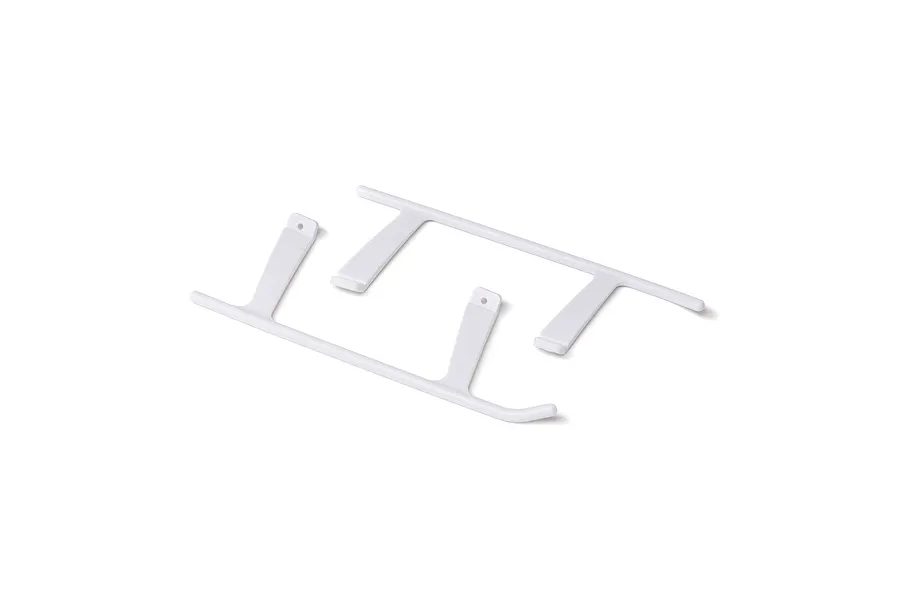 Studio product shot of Blade white landing gear pieces for the InFusion 210 helicopter against a plain white background.