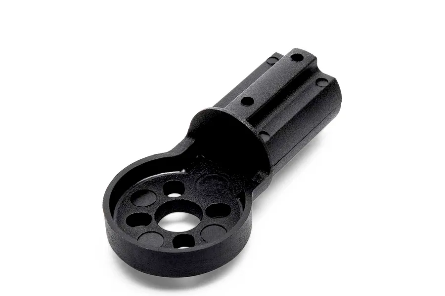 Black molded plastic tail motor mount for Blade InFusion 210 helicopter, shown on a clean white background.