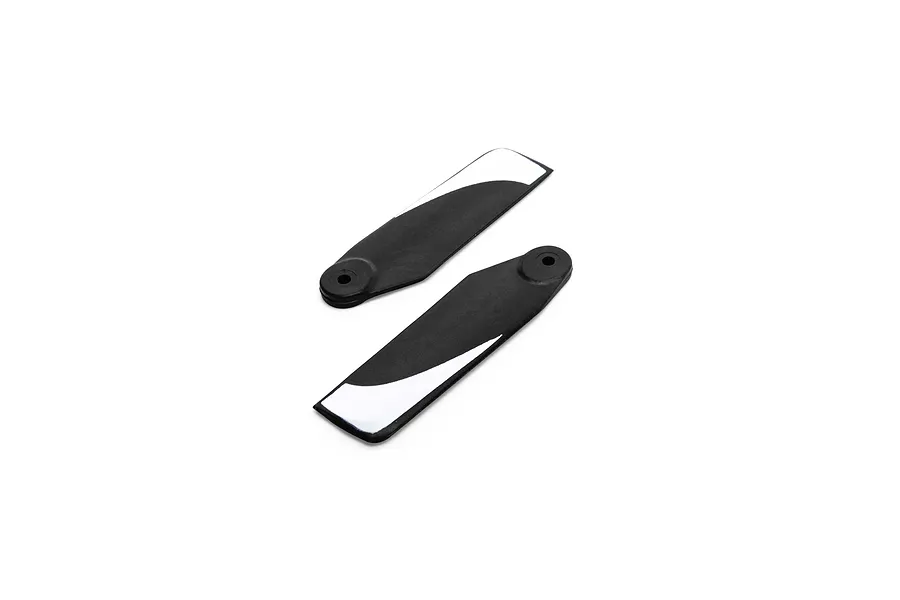 Two black and white RC helicopter tail rotor blades laid flat against a clean white background.