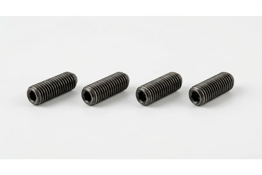 Four black threaded grub screws with hex socket drives arranged in a line on a plain white background.