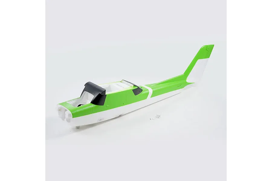 FMS 1220mm RC airplane fuselage in green and white foam against a neutral background.