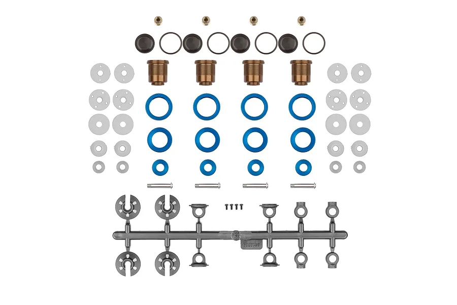 Top-down studio shot of the Team Associated 1/10 shock absorber rebuild kit components laid out on a white background.