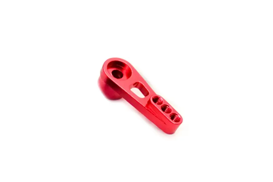 Red anodized metal servo horn viewed from above against a plain white background.