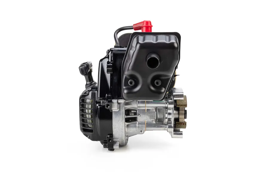 Studio shot of a Losi FJ350 petrol RC engine with black muffler and pull start on a white background.