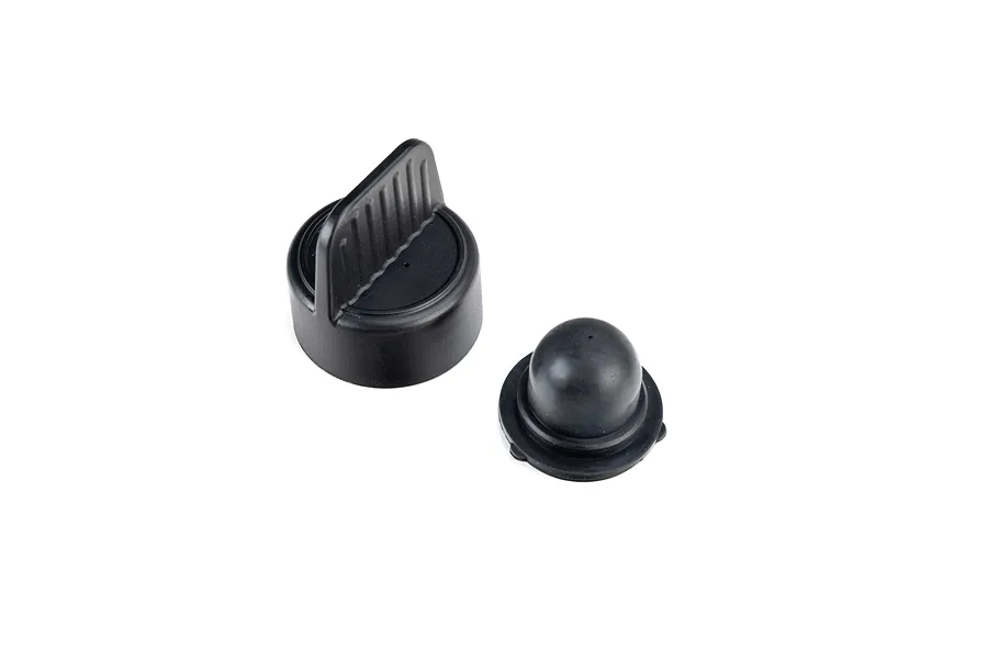 Losi black gas tank cap set with a pull tab and a separate rubber primer bulb on a white background.