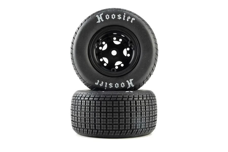 Studio shot of two Losi 1/10 Hoosier medium compound RC tyres on black rims, one stacked in front of the other showing tread and sidewall.