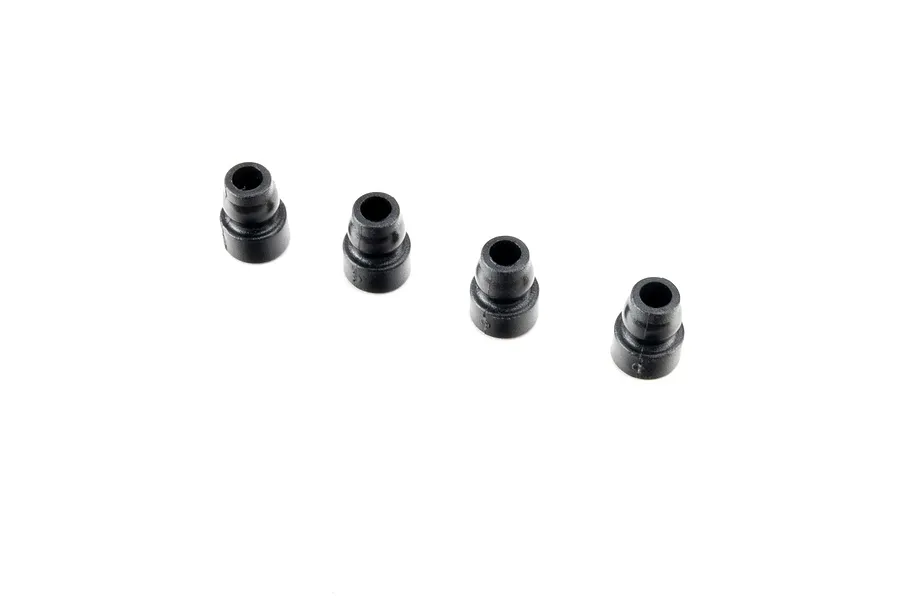Four black plastic upper shock bushings shown against a plain white background.