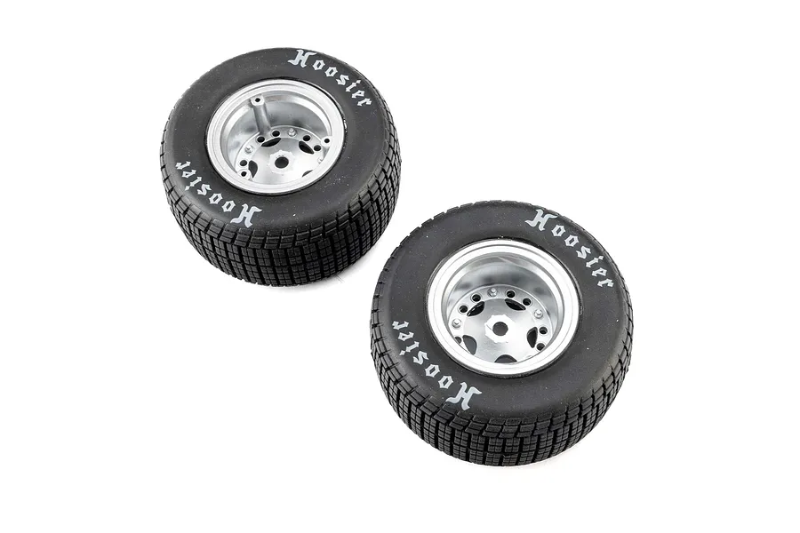 Two Losi 1/10 Hoosier soft compound RC tyres mounted on silver satin rims, viewed from an overhead angle against a white background.