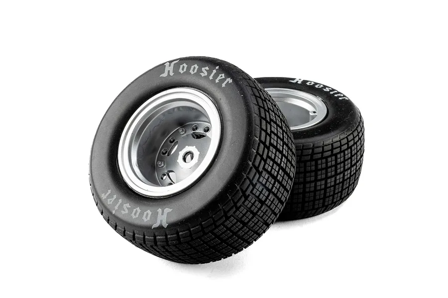 Two Losi 1/10 Hoosier medium compound RC tyres on satin rims, displayed against a clean white background.
