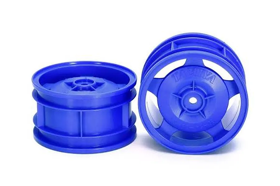 Two blue Tamiya star dish rear off-road buggy rims shown from different angles against a plain white background.