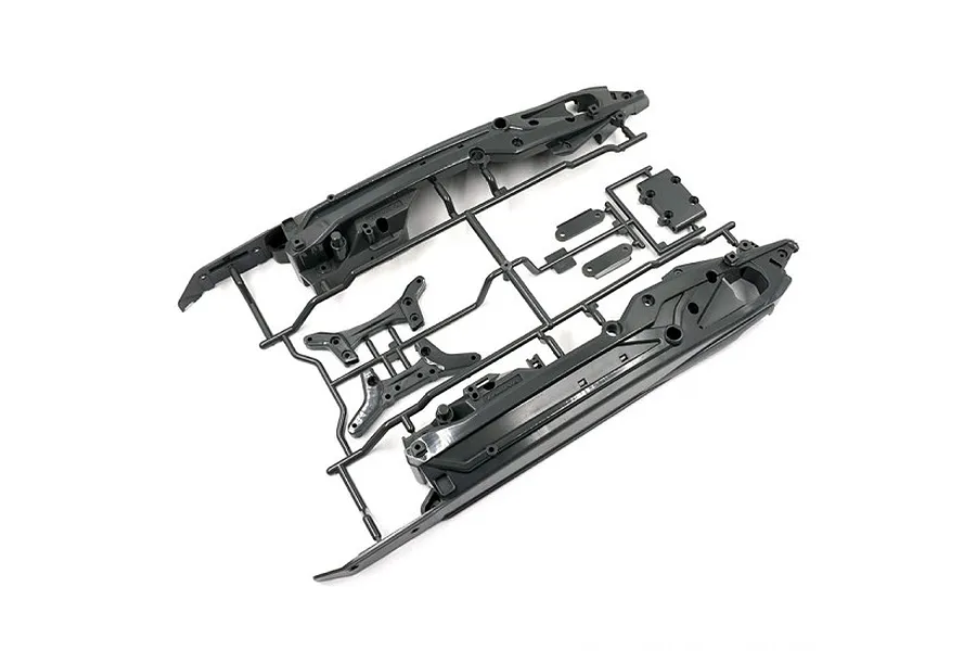 Tamiya DT-03 plastic parts tree showing chassis components in dark grey against a plain white background.