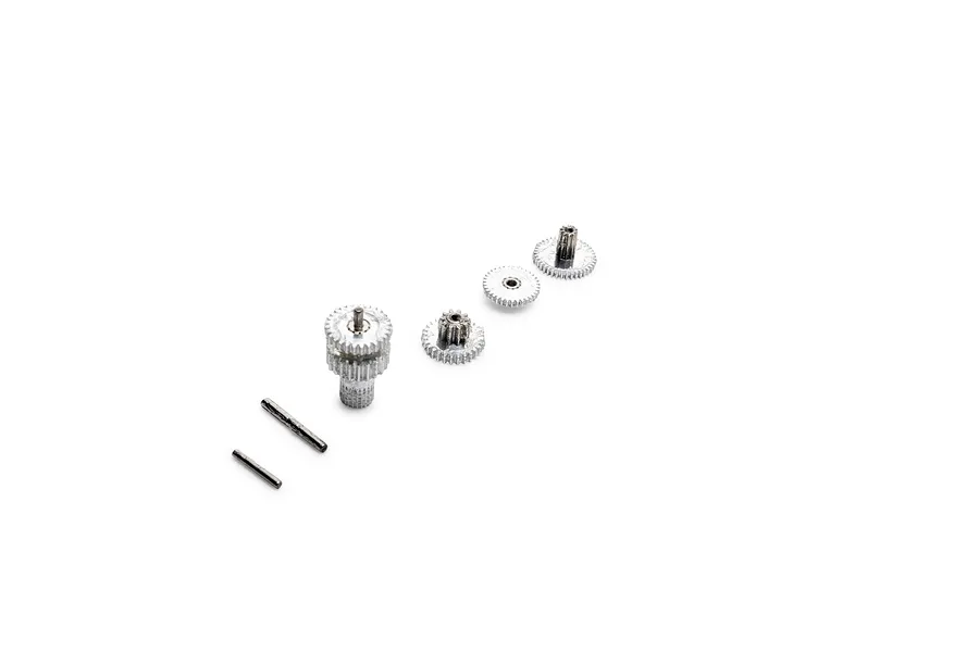 Spektrum servo gear set layout consisting of metal gears and small steel pins on a clean white background.