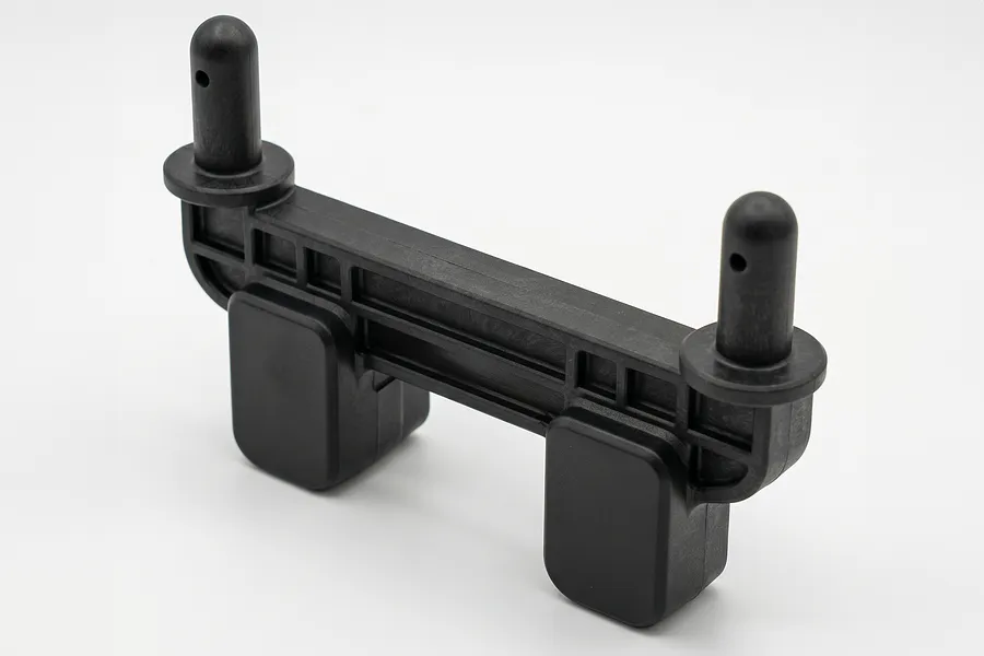 A black plastic RC rear body post mount viewed against a clean white studio background.