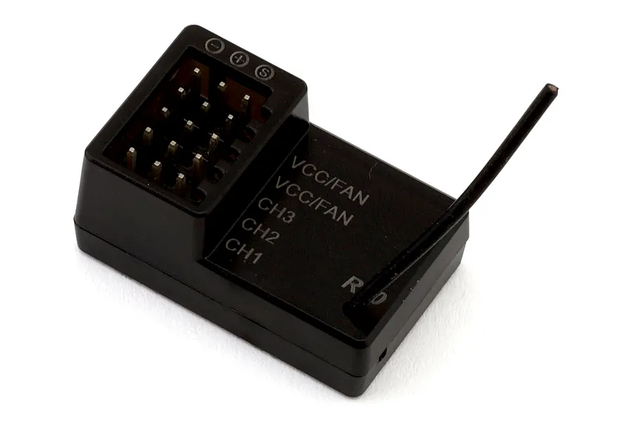 Black MJX RC receiver unit featuring channel pins and an antenna against a white background.