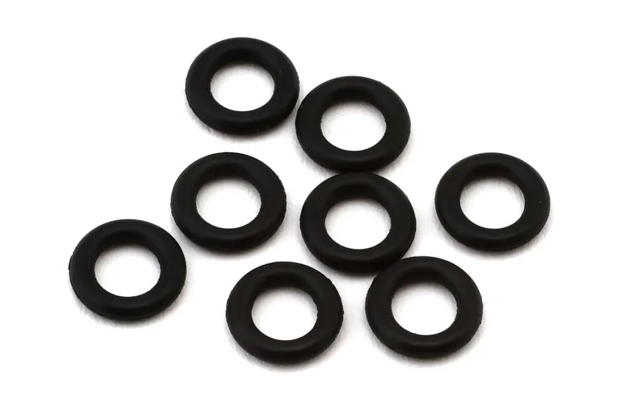 A set of eight small black rubber washers arranged on a clean white background.
