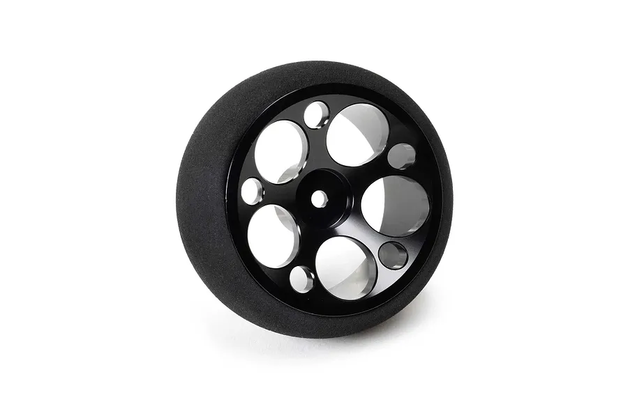 Spektrum black aluminium wide circle transmitter wheel with foam grip against a plain white background.