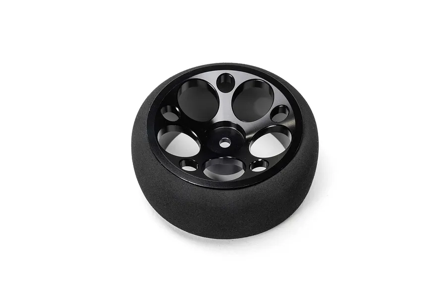 Spektrum black aluminium wide circle transmitter wheel with foam grip against a white background.