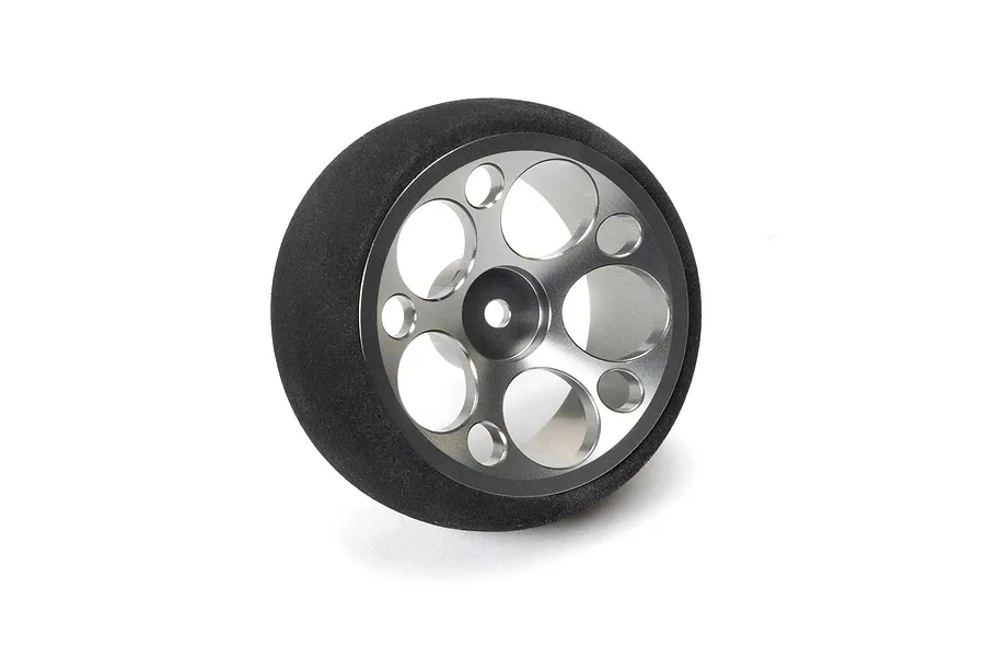 Spektrum aluminium wide circle transmitter wheel in gunmetal grey with a black foam grip on a white background.