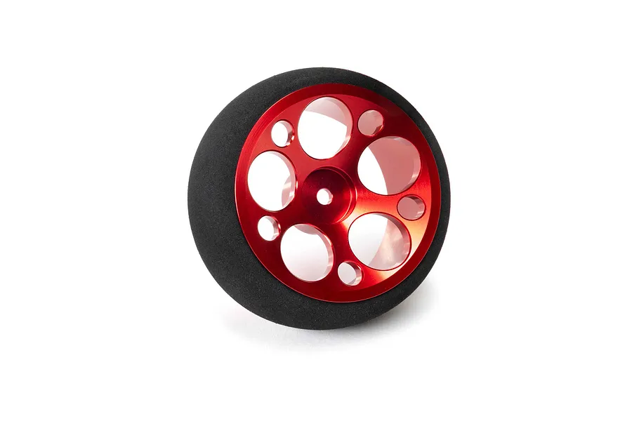 Spektrum red aluminium wide circle transmitter wheel featuring a black foam grip on a clean white background.