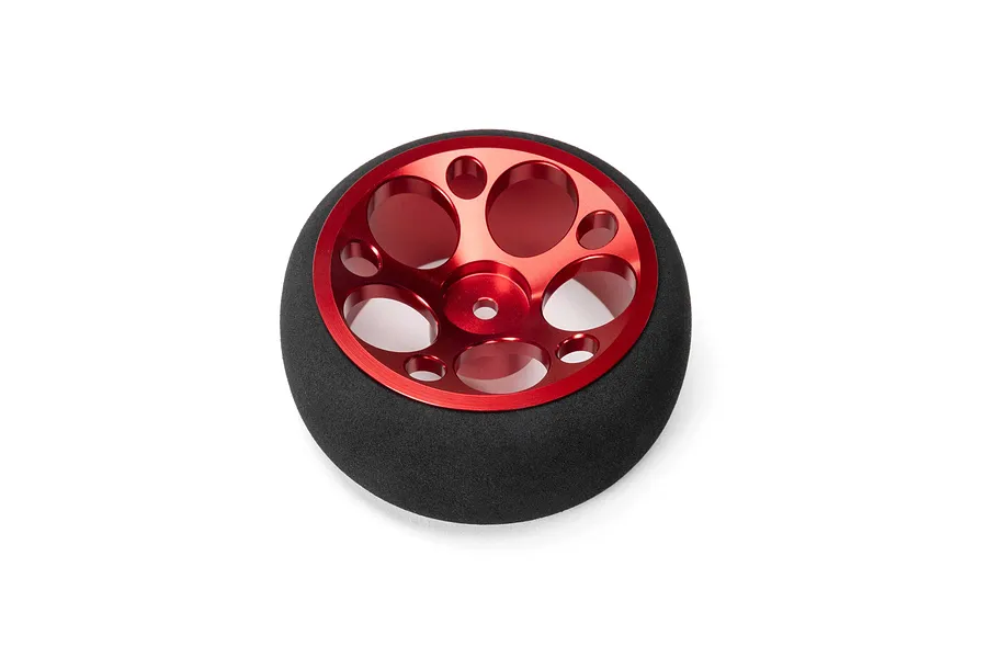 Spektrum red aluminium wide circle transmitter wheel with a black foam tyre, photographed on a clean white background.