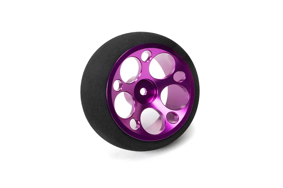 Spektrum purple aluminium wide circle RC transmitter wheel with black foam grip on white background.