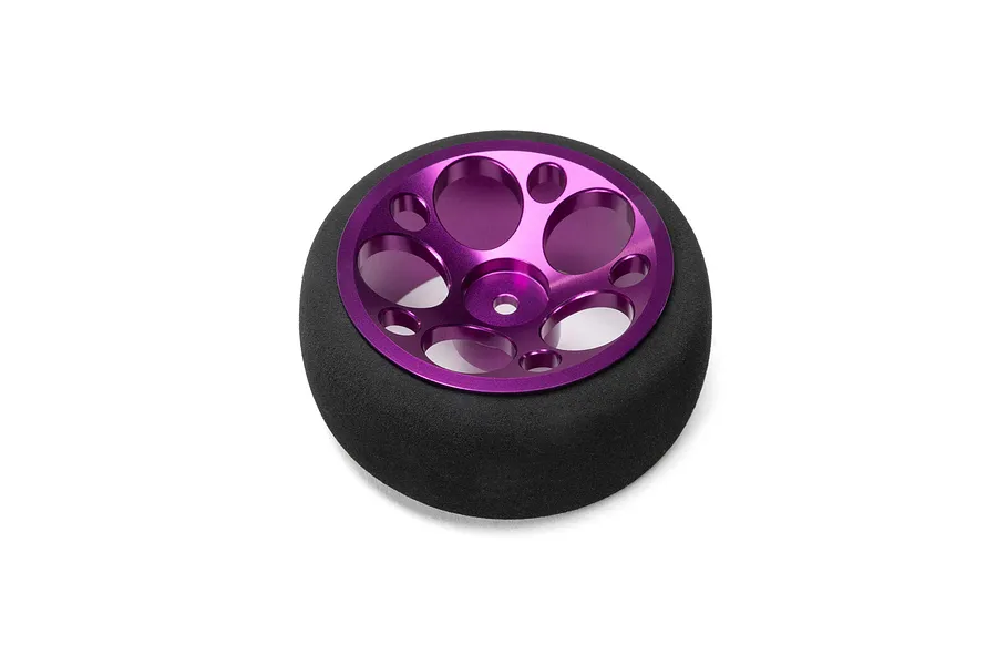 Spektrum aluminium wide circle transmitter wheel in purple with black foam grip on a clean white background.