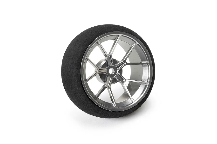 Spektrum gunmetal grey aluminium wide spoke transmitter wheel with a black foam tyre against a clean white background.