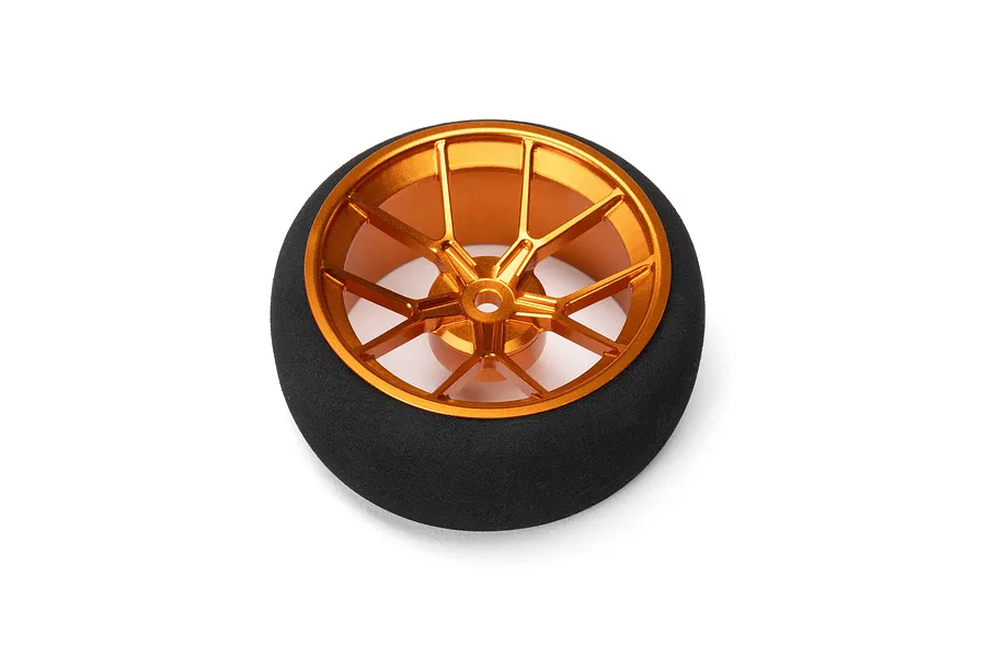 Spektrum orange aluminium wide spoke transmitter wheel with black foam grip isolated on a white background.