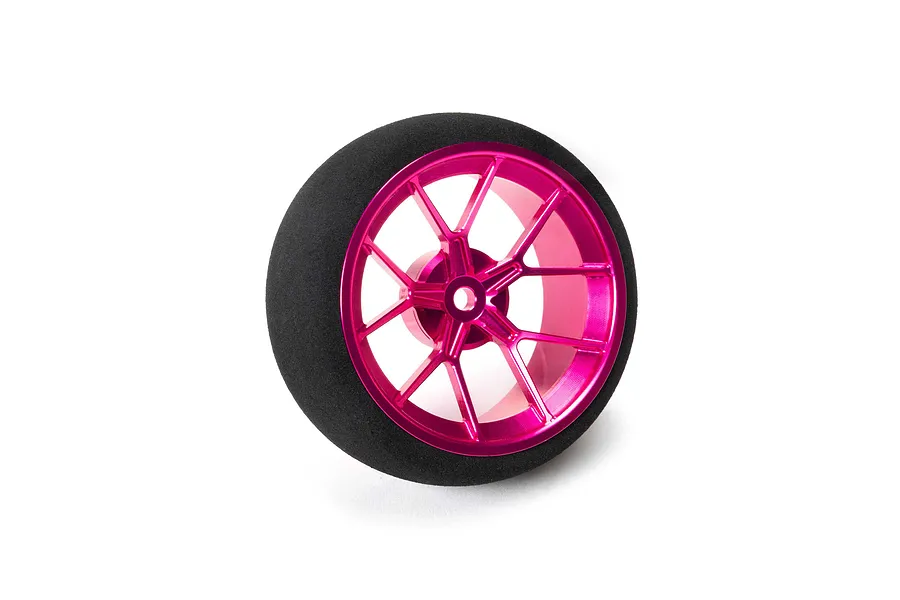Spektrum wide spoke RC transmitter wheel with a bright pink metallic rim and a thick black foam grip on a white background.