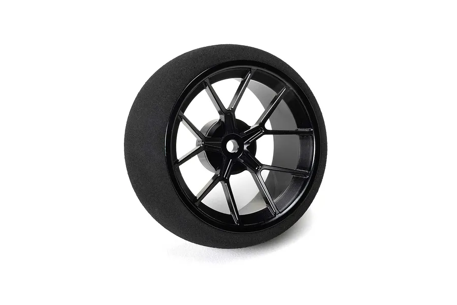 Spektrum black aluminium wide spoke transmitter wheel with a foam grip against a plain white background.