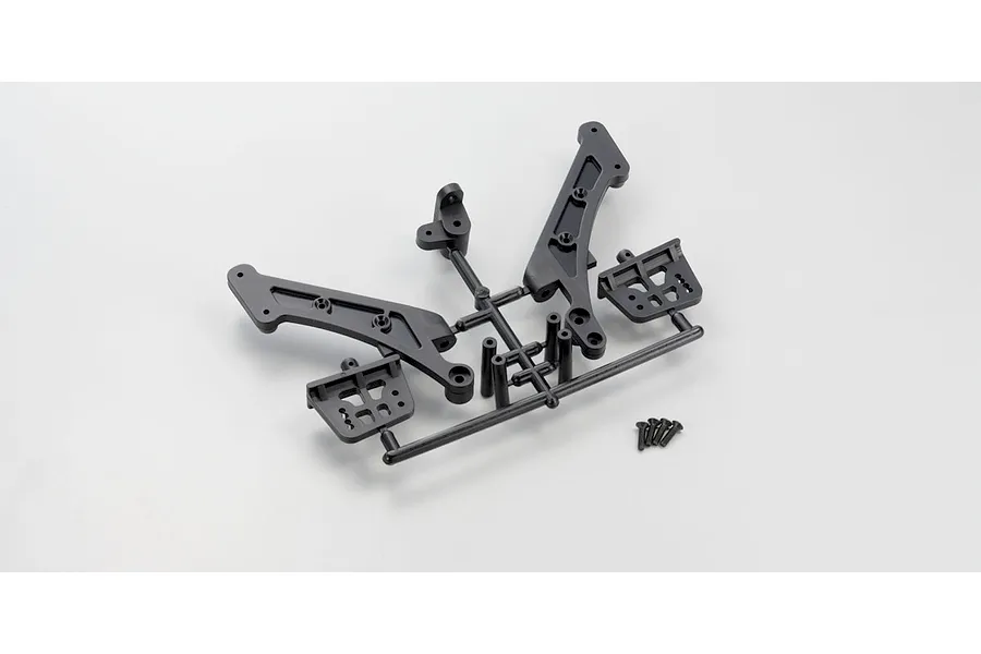 Kyosho long wing mount parts tree and small screws on a plain white background.