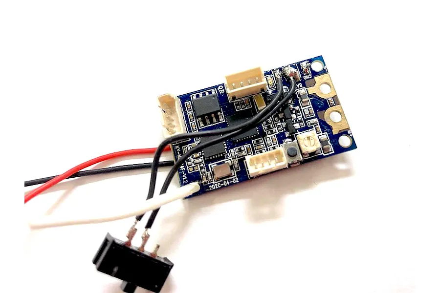 Kyosho Mini-Z 4x4 ESC and receiver circuit board with attached power switch, wires, and connectors against a white background.