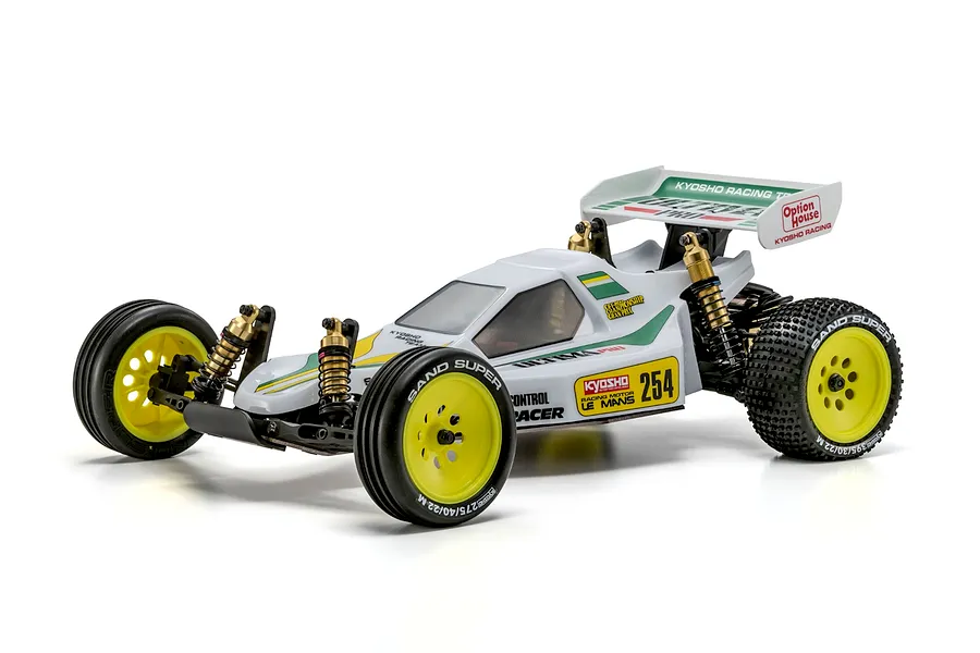 Kyosho Ultima Pro 1/10 electric 2WD RC buggy model in white with yellow wheels and gold shocks on a clean white background.